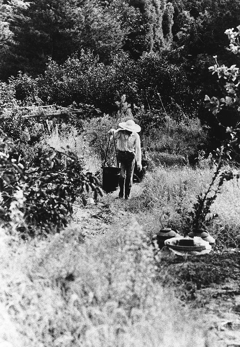 Carrying water to a mountain field