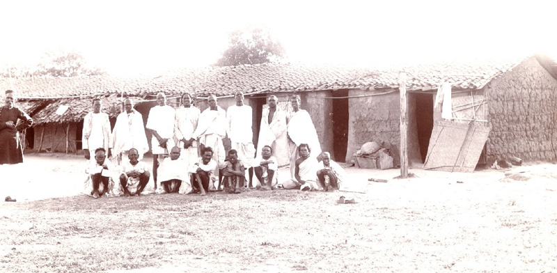 Male inmates, Champa. Front view of huts. November, 1903
