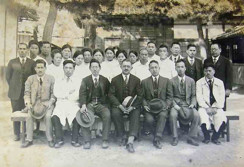 Staff at Oshima, with Dr Wade